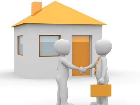 Immobilien-Makler mit Kunden